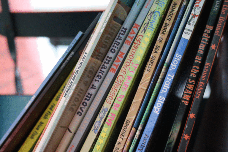 children's books slanted on a shelf