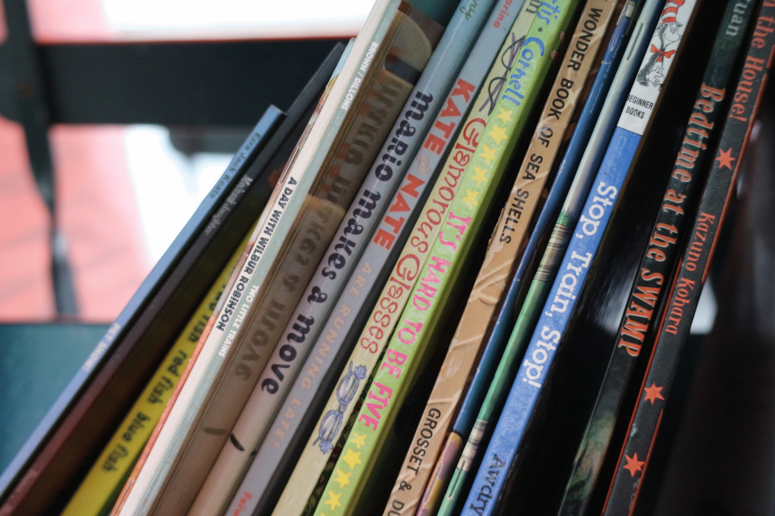 children's books slanted on a shelf