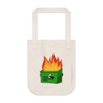 A natural cream-colored canvas tote bag with two short handles, laid flat against a white background. The bag features an illustration of a green dumpster on fire with large orange and red flames, with the text "Urban Librarians Unite" and a megaphone icon printed on the front.